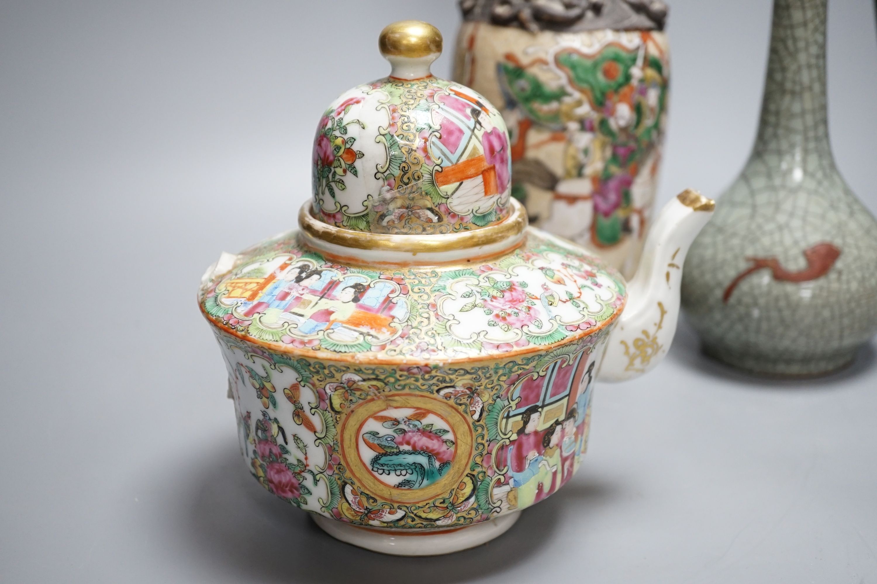 A Chinese famille rose crackleglaze vase, 29cm, together with a famille rose teapot and a crackleglaze celadon ground bottle vase